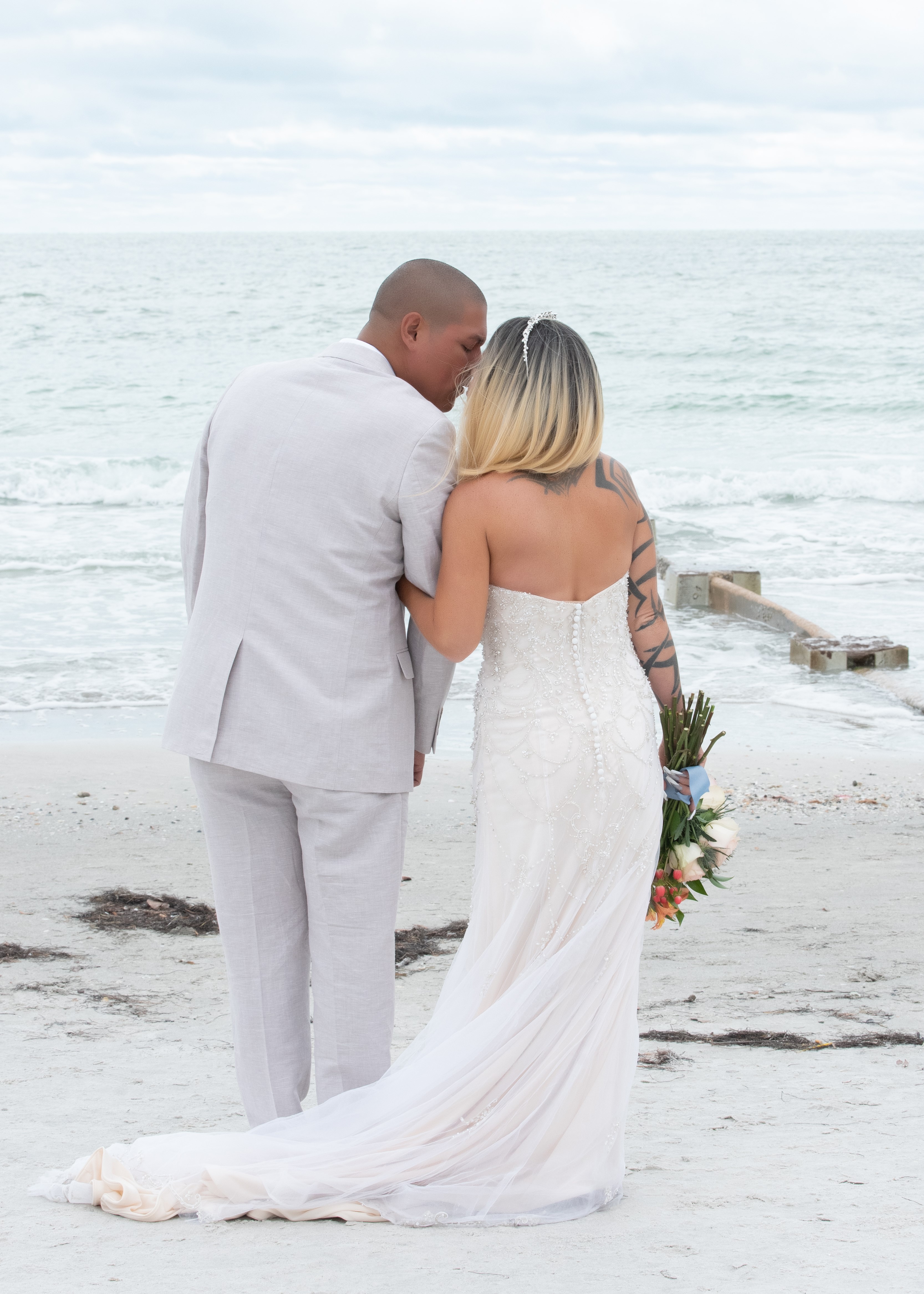 bride and groom on the beach