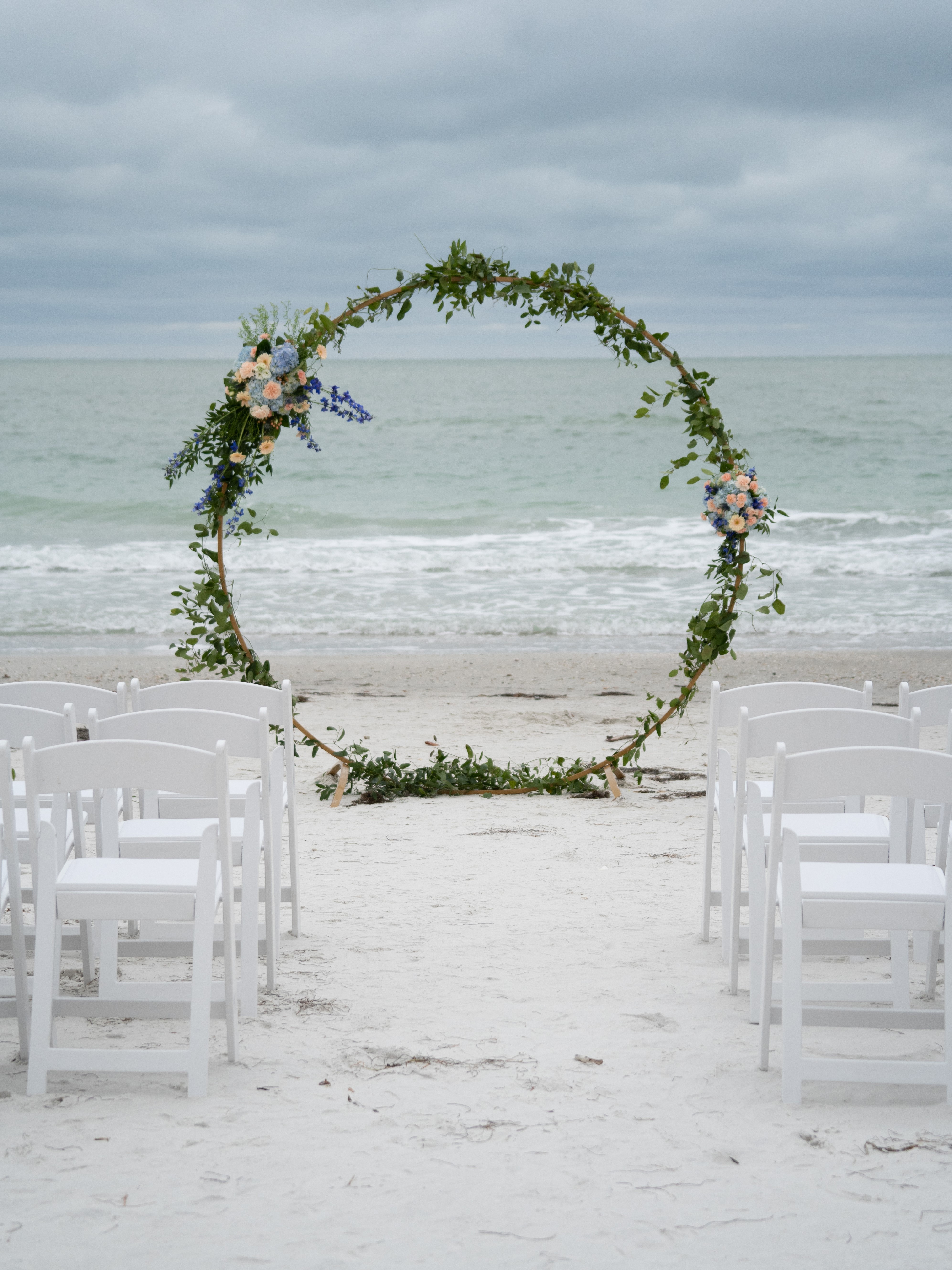 circular arch on Madeira Beach wedding ceremony by Precious Moments Events