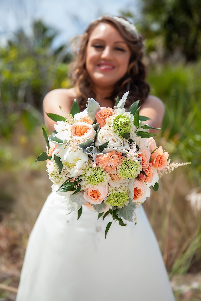 bridal bouquet with white and peach flowers