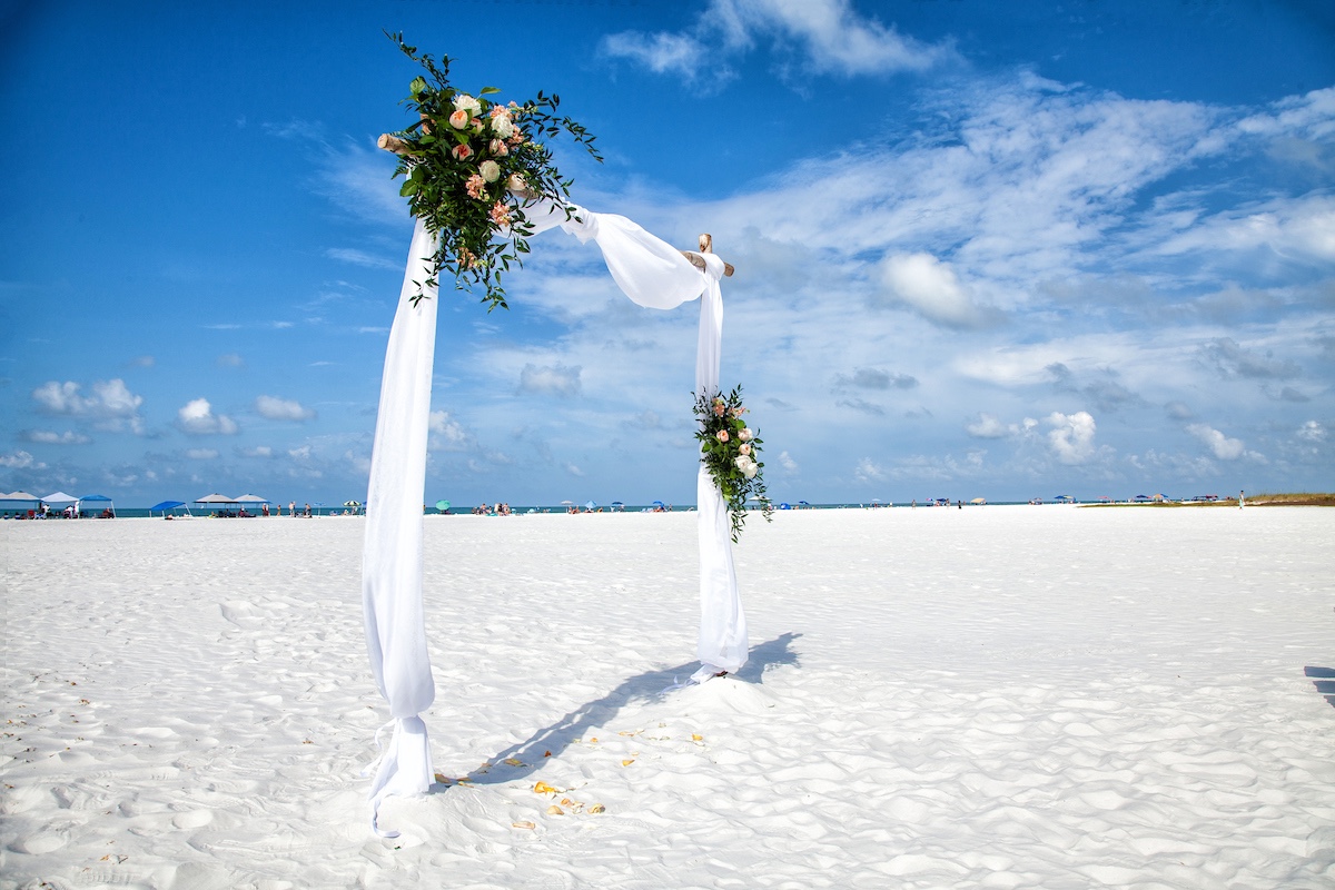 Birchwood Arch for beach ceremony by Precious Moments Events