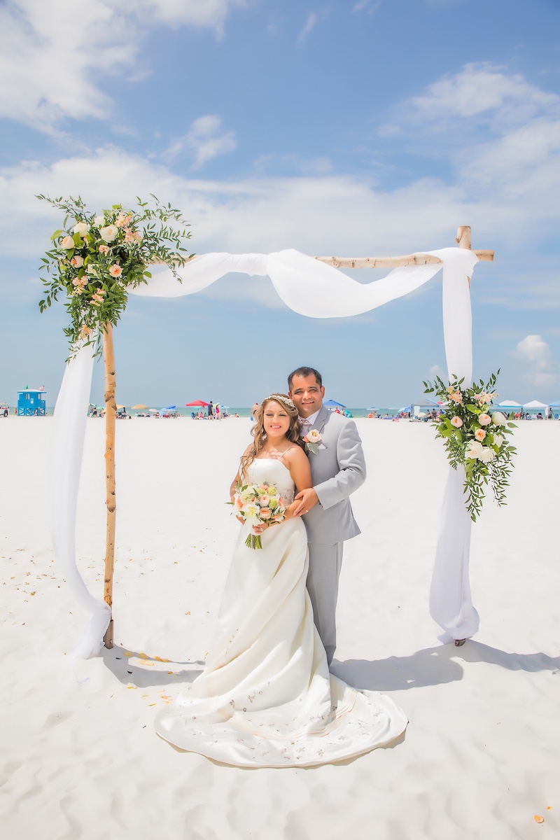 bride and groom at their beach wedding ceremony