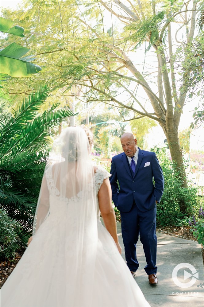 brides first look with her father at Marie Selby Botanical Gardens 