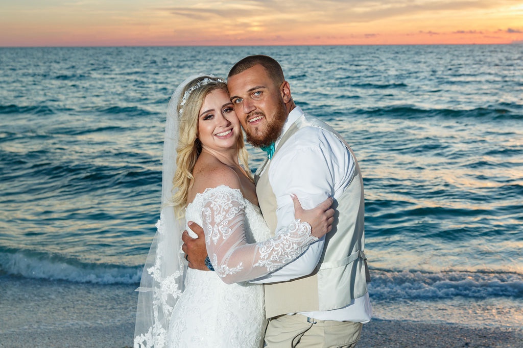 Bride & Groom Sunset; Sandcastle Resort at Lido Beach Wedding; Precious Moments Events