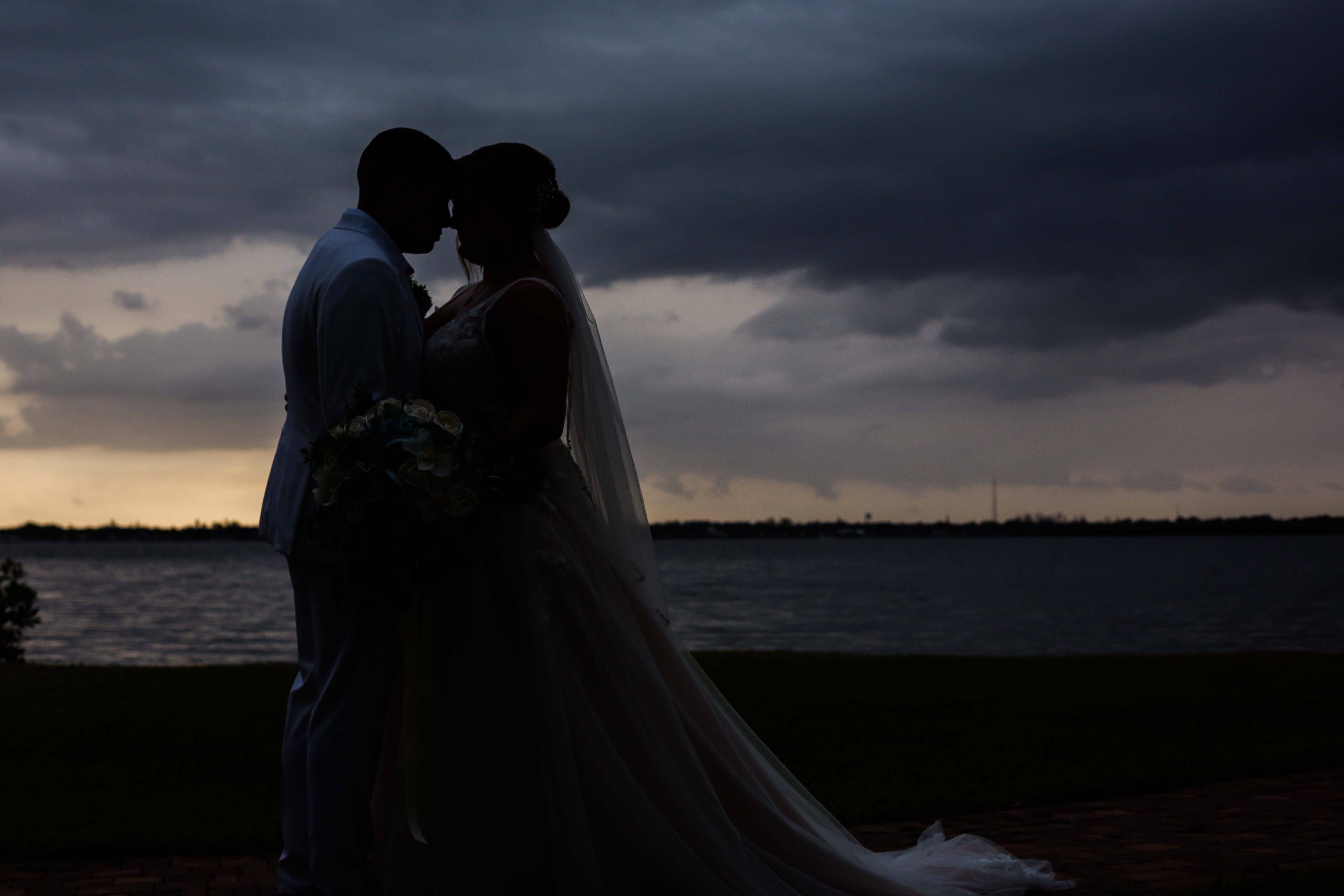 Sunset Bride & Groom; White Orchid at Oasis; Precious Moments Events