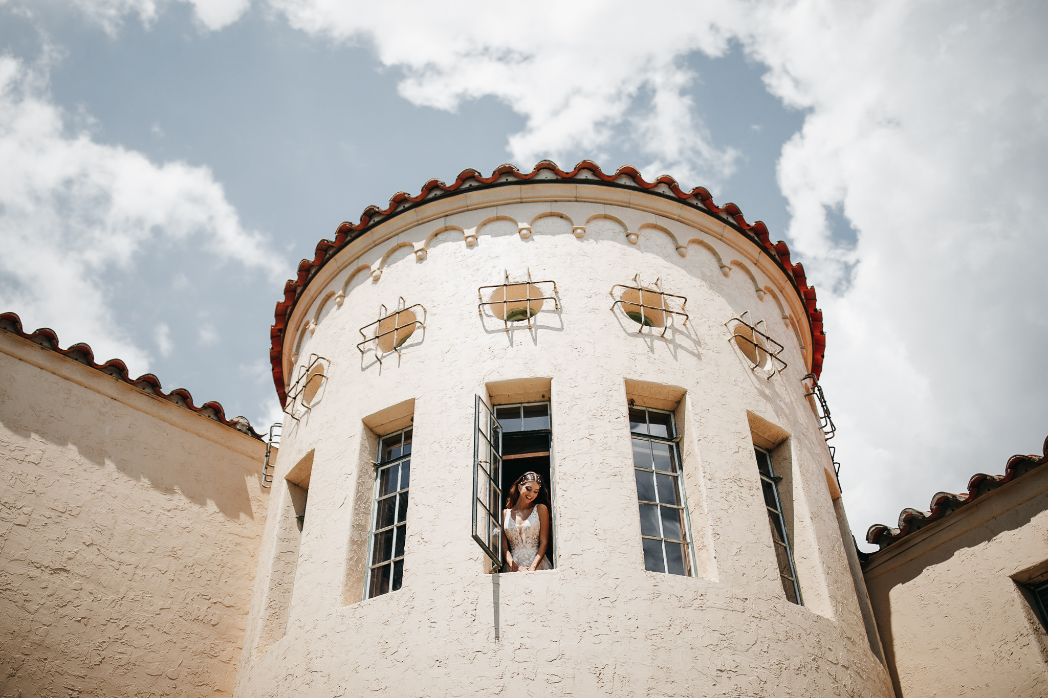 bride posing inside tower at Powel Crosley Estate