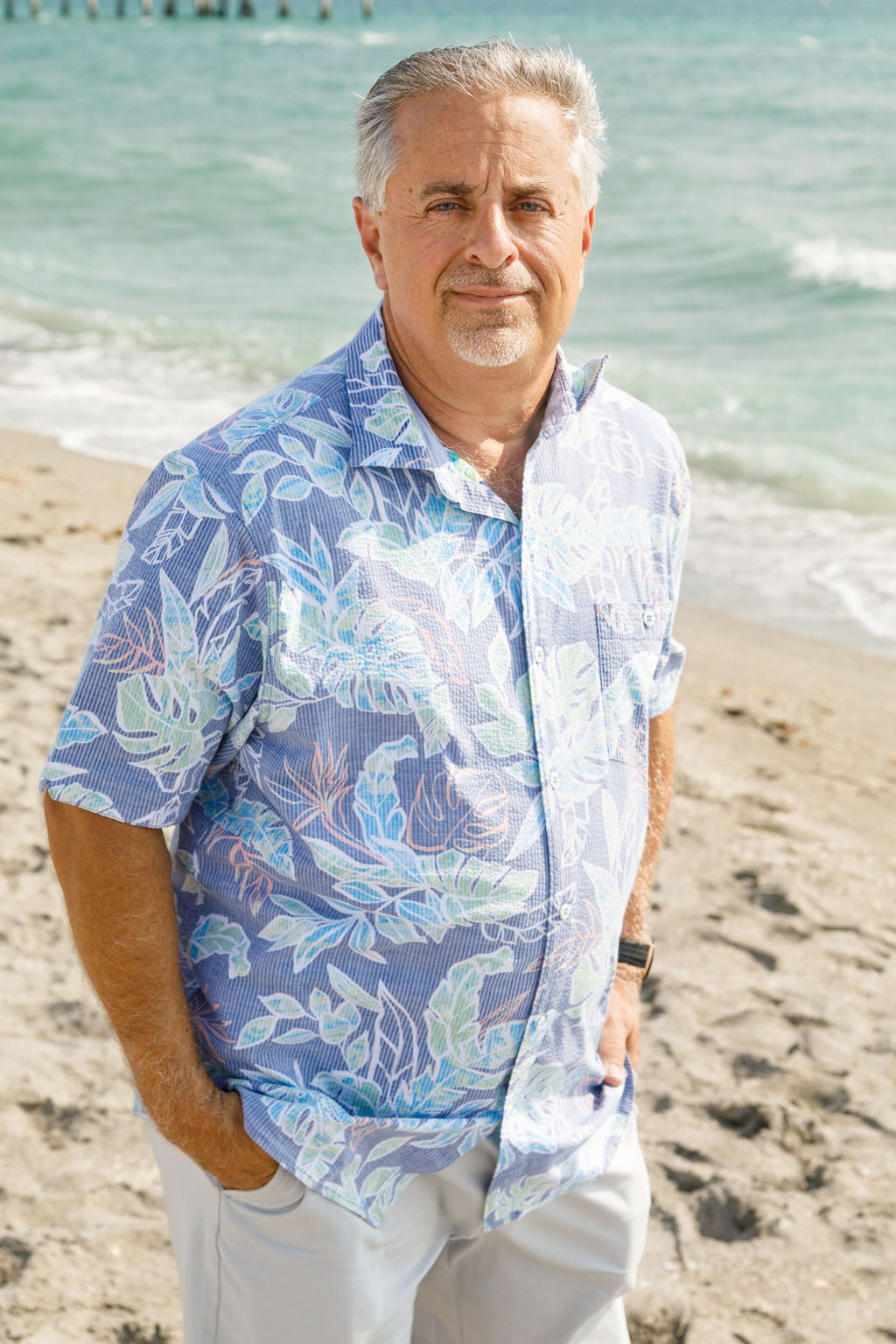 groom in slacks and patterned shirt for wedding