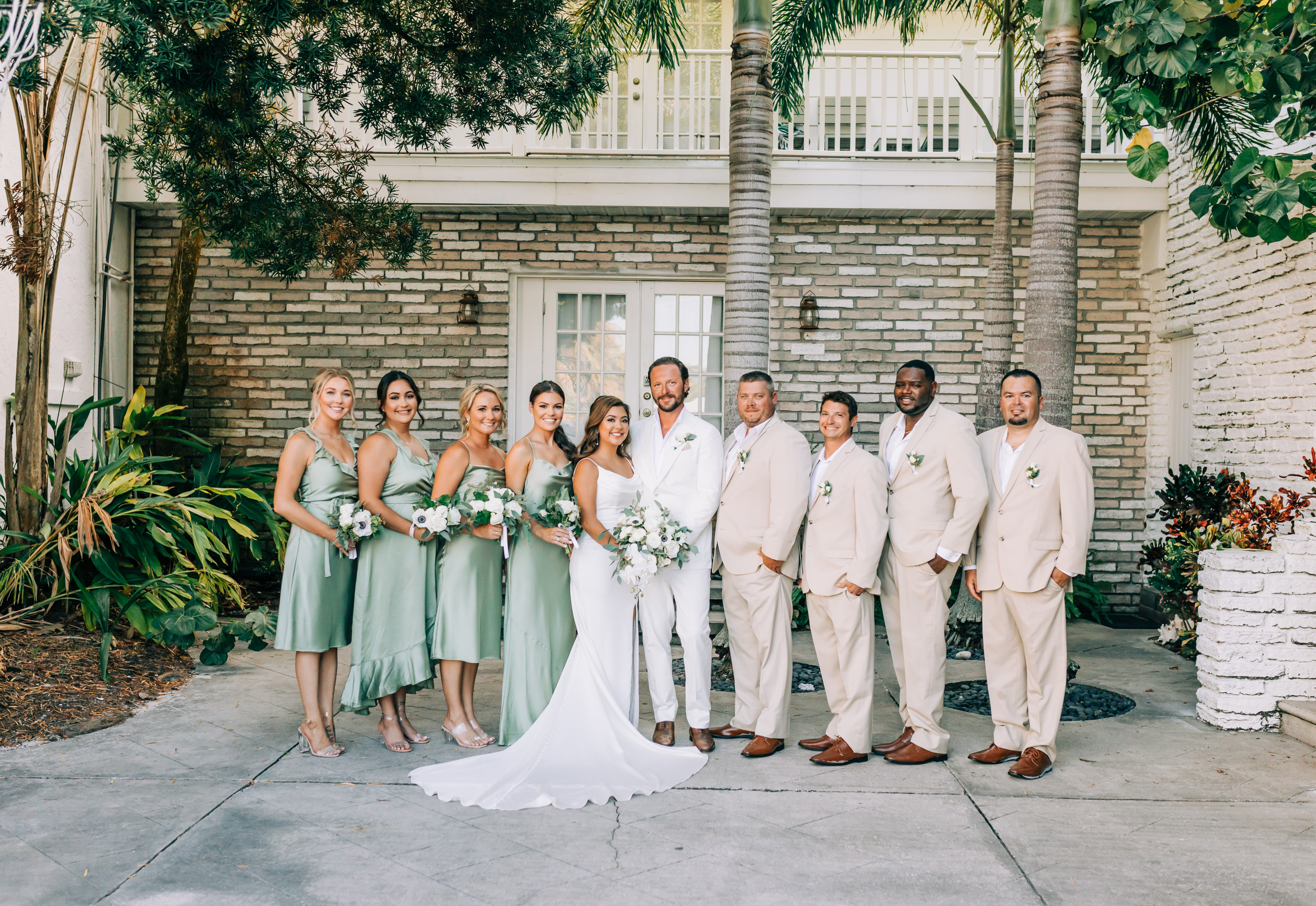 wedding party in green and tan