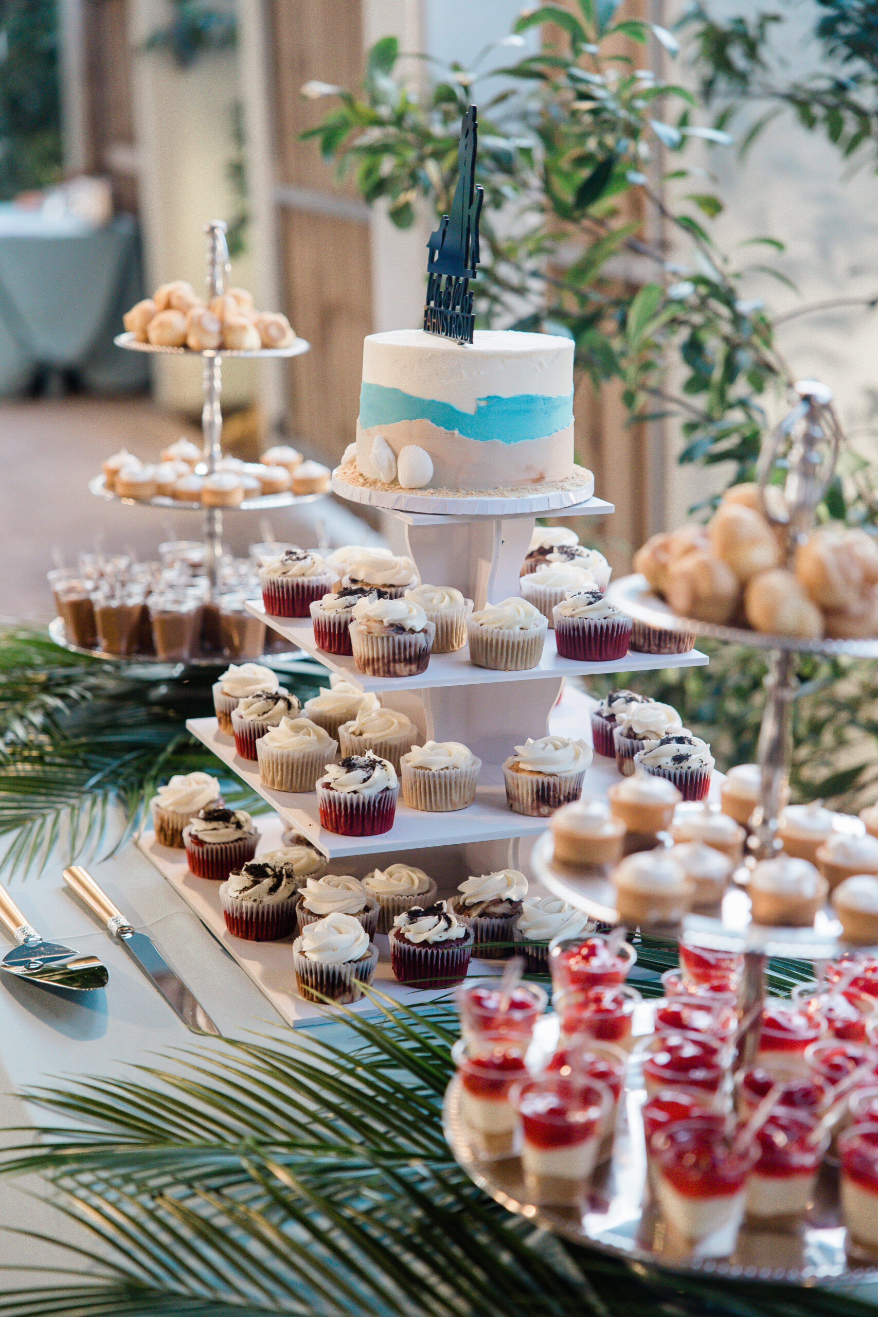 wedding dessert table with different cupcakes