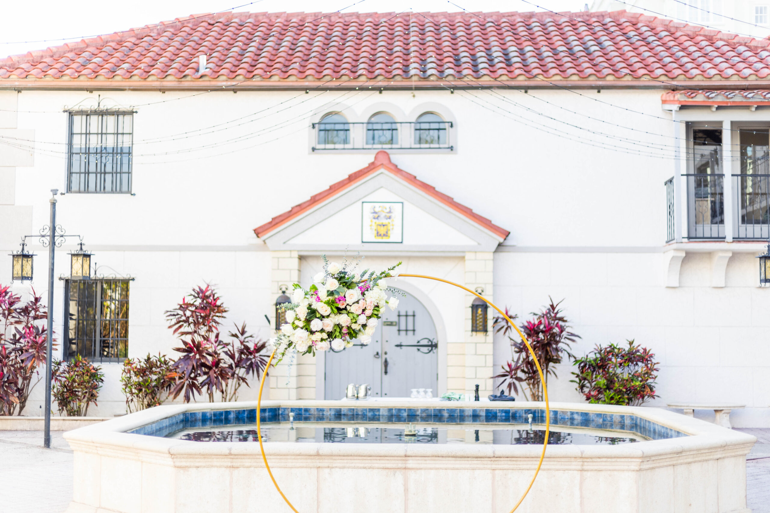 circular wedding arch with florals