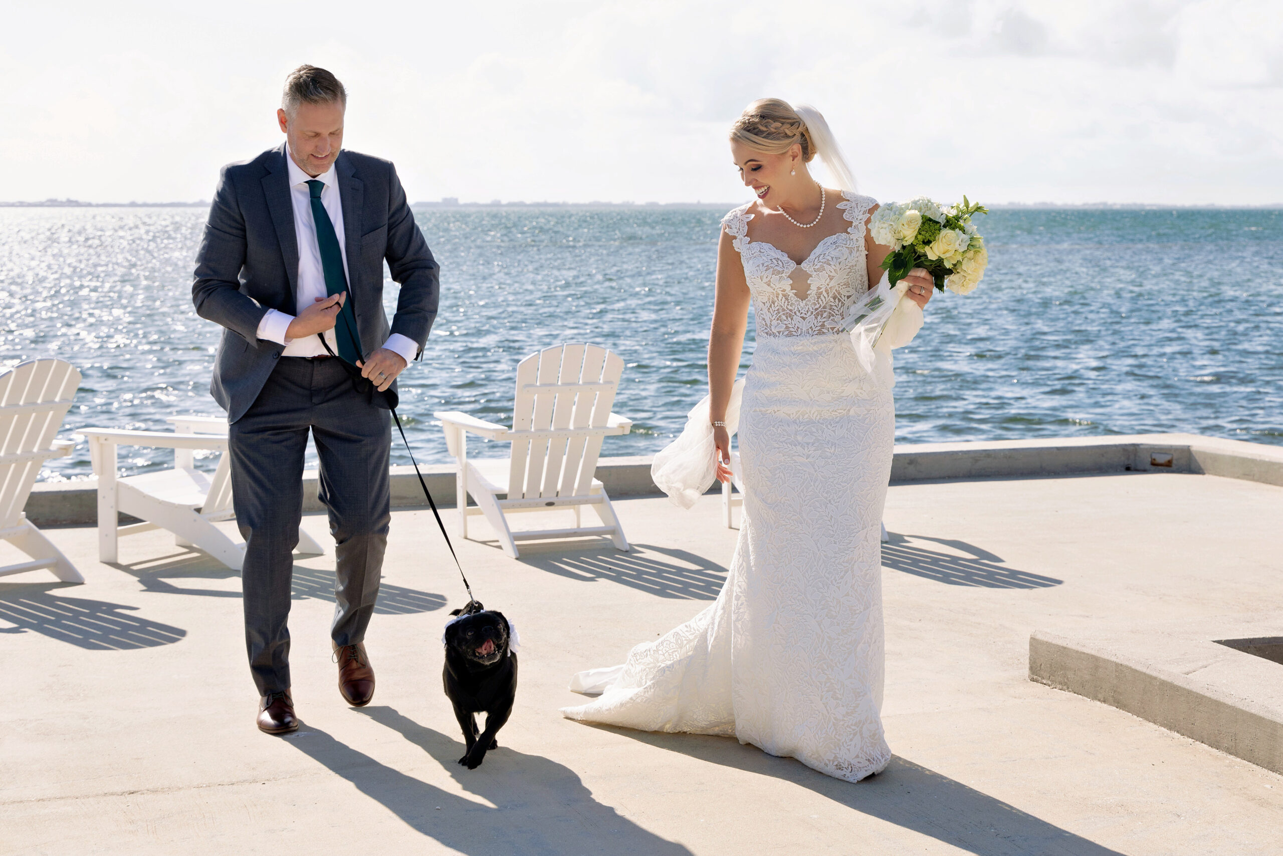 bride and groom with their dog