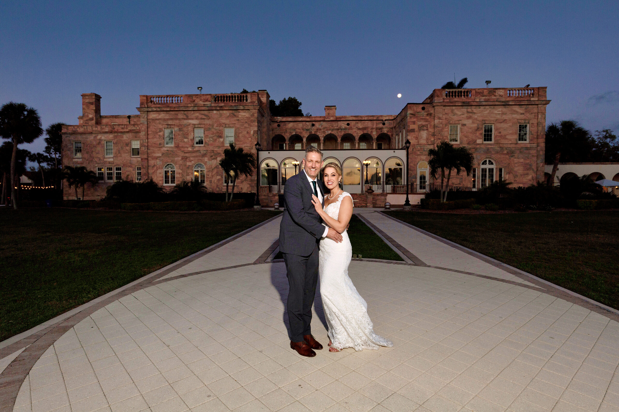 bride and groom at Historical Ringling Mansion, College Hall