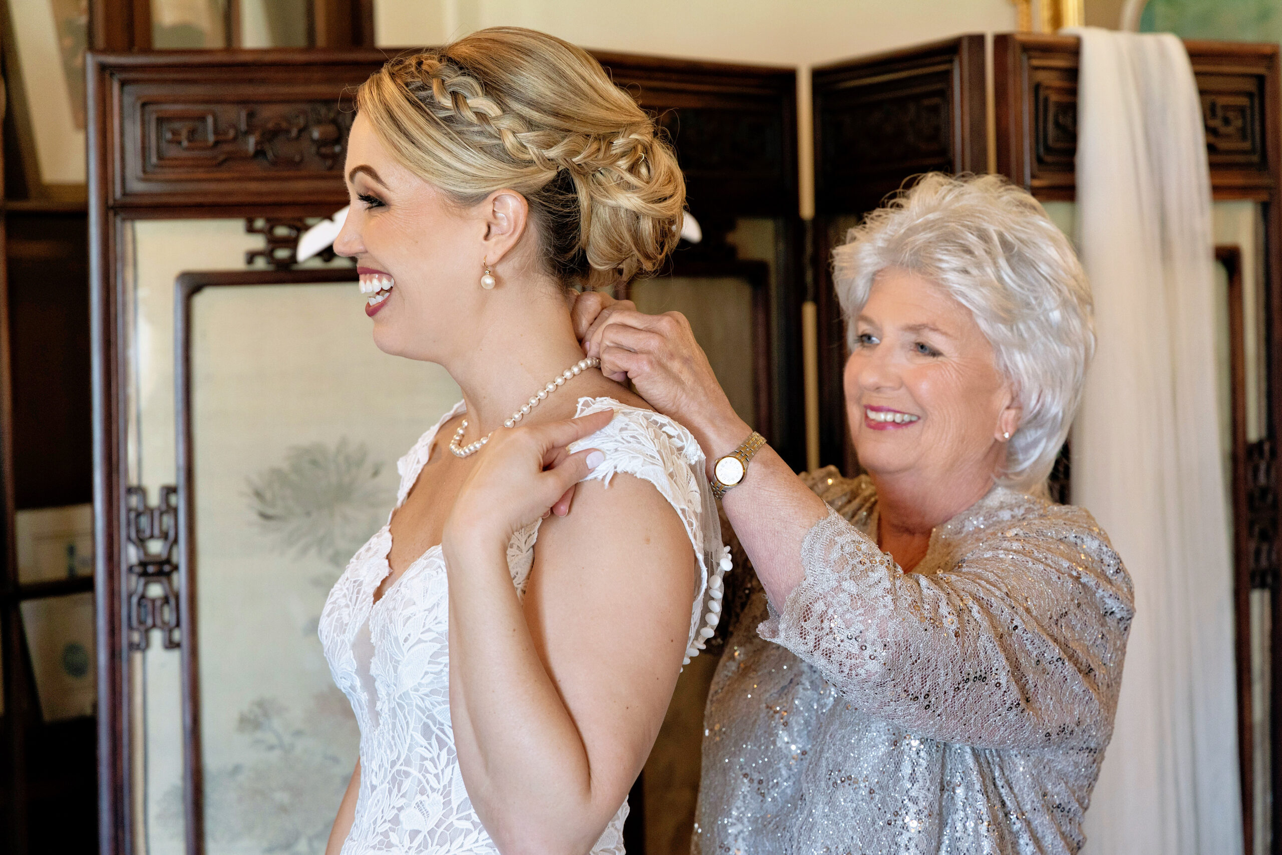 bride getting ready for her Historical Ringling Mansion, College Hall wedding