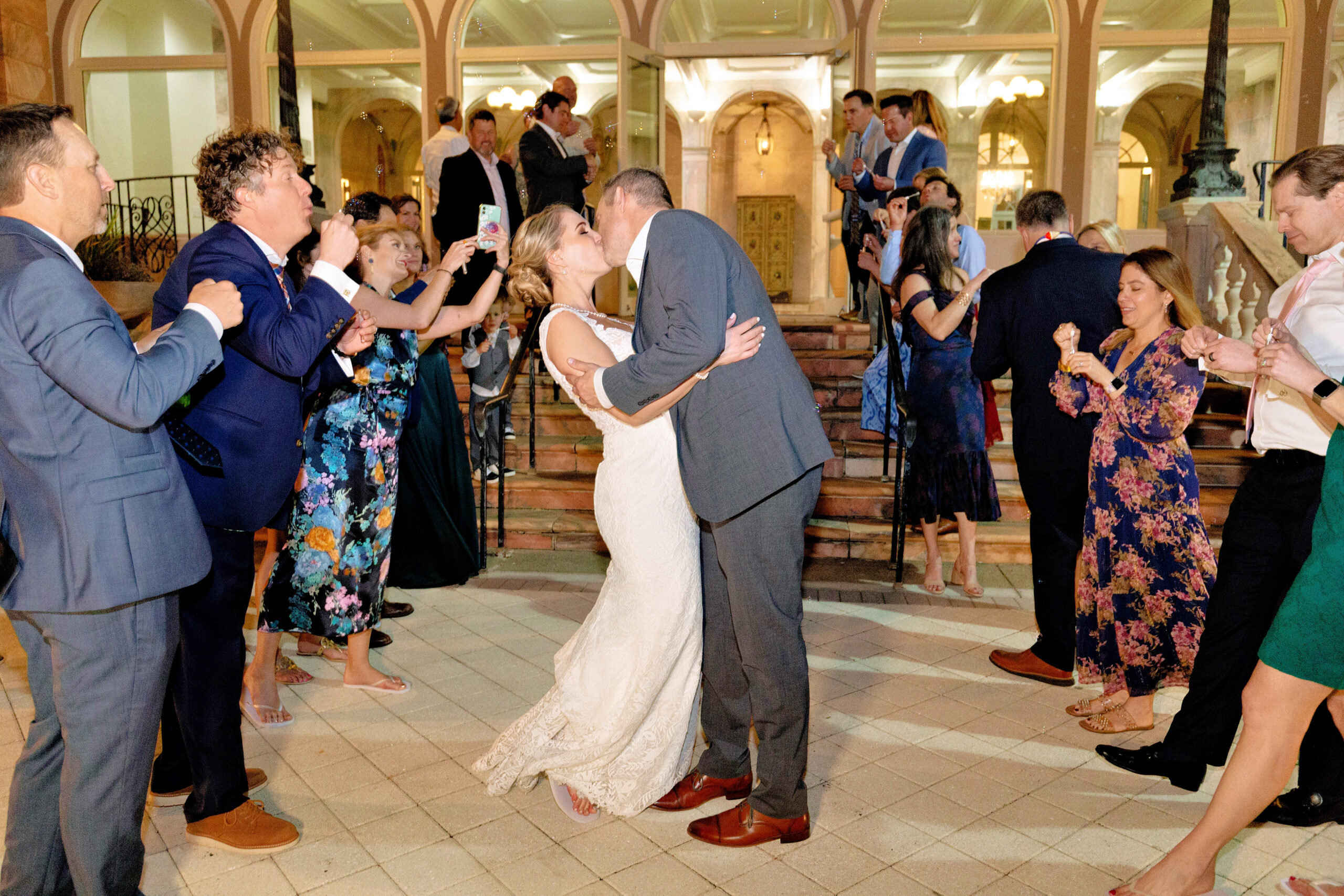 bride and groom after their Historical Ringling Mansion, College Hall wedding ceremony