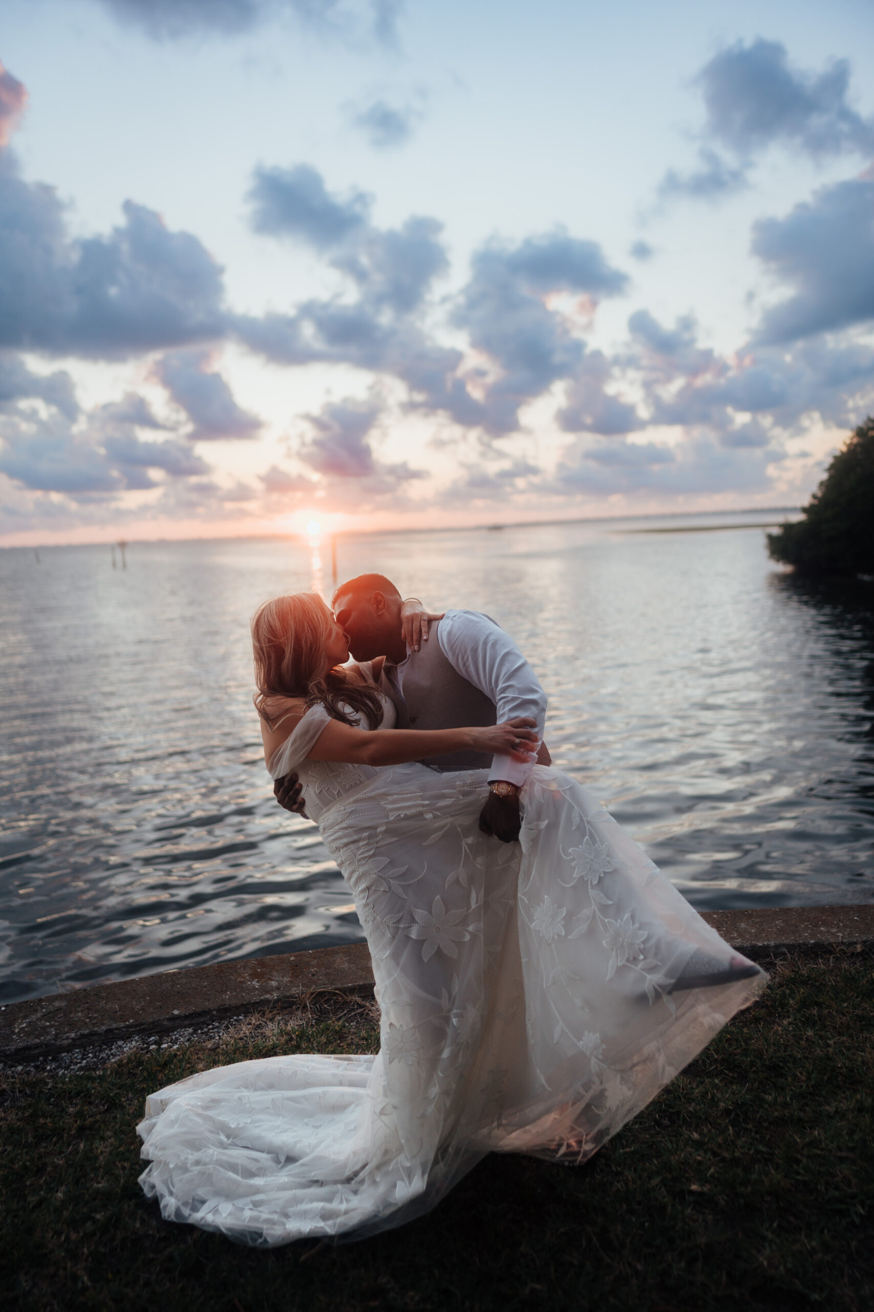 bride and groom next to Florida coast at Powel Crosley Estate