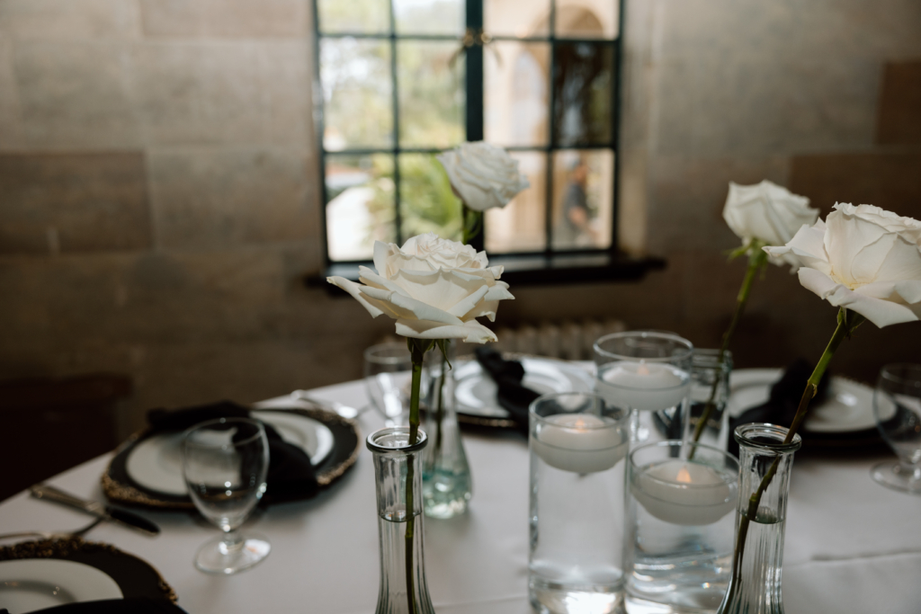 simple white rose centerpieces for wedding 