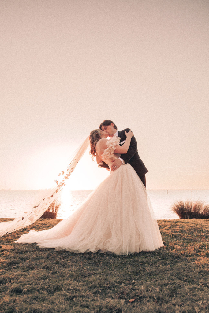 bride and groom by the Florida coast at Powel Crosley Estate