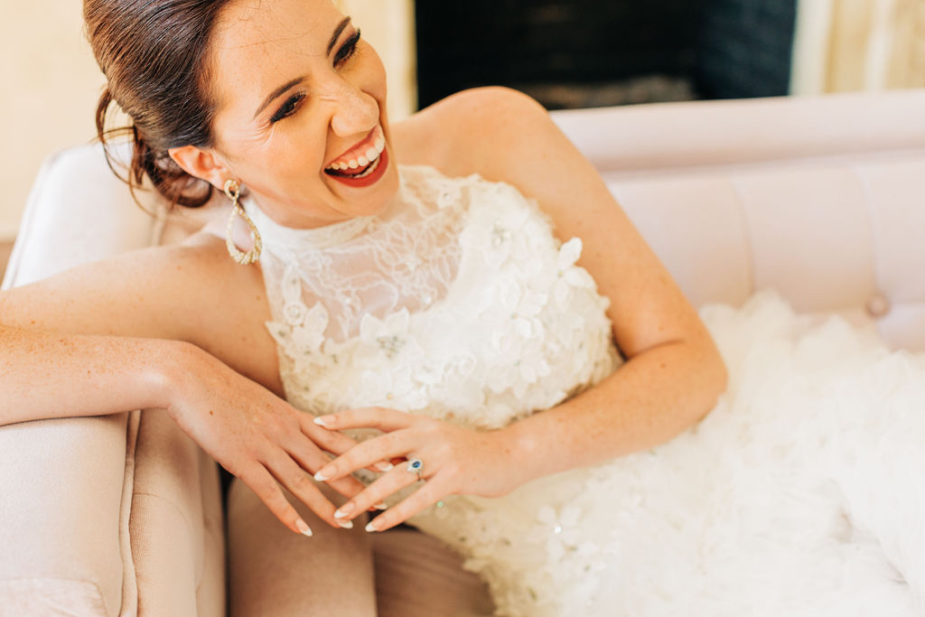 bride in embroidered wedding gown