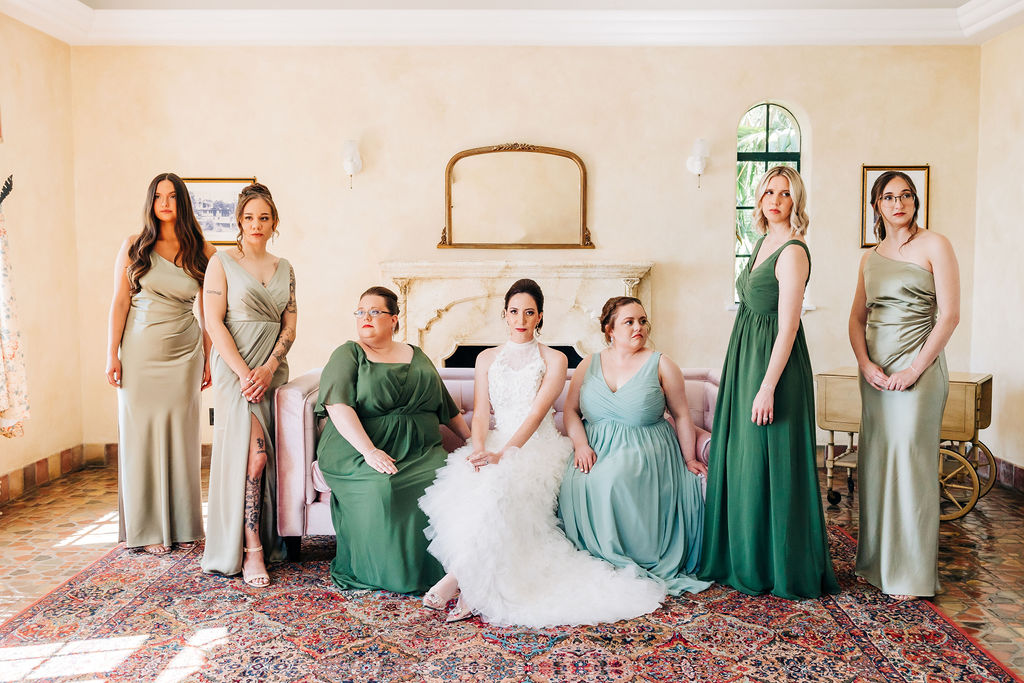 bridesmaids in shades of green for Florida wedding