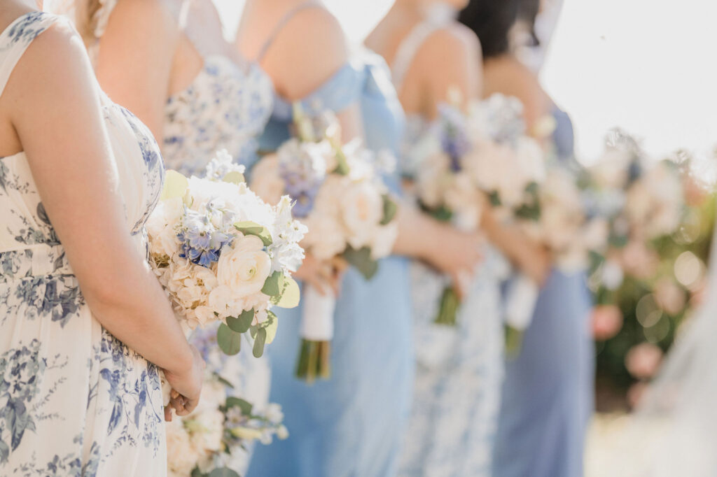 bridesmaids in shades of blue and different patterns