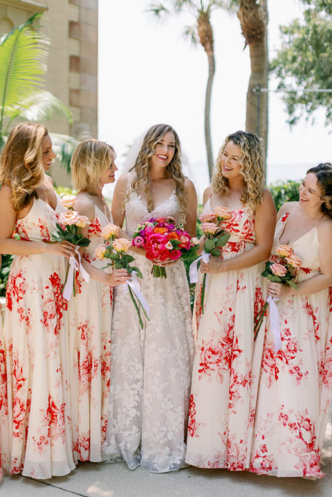 bridesmaids in pink floral dresses