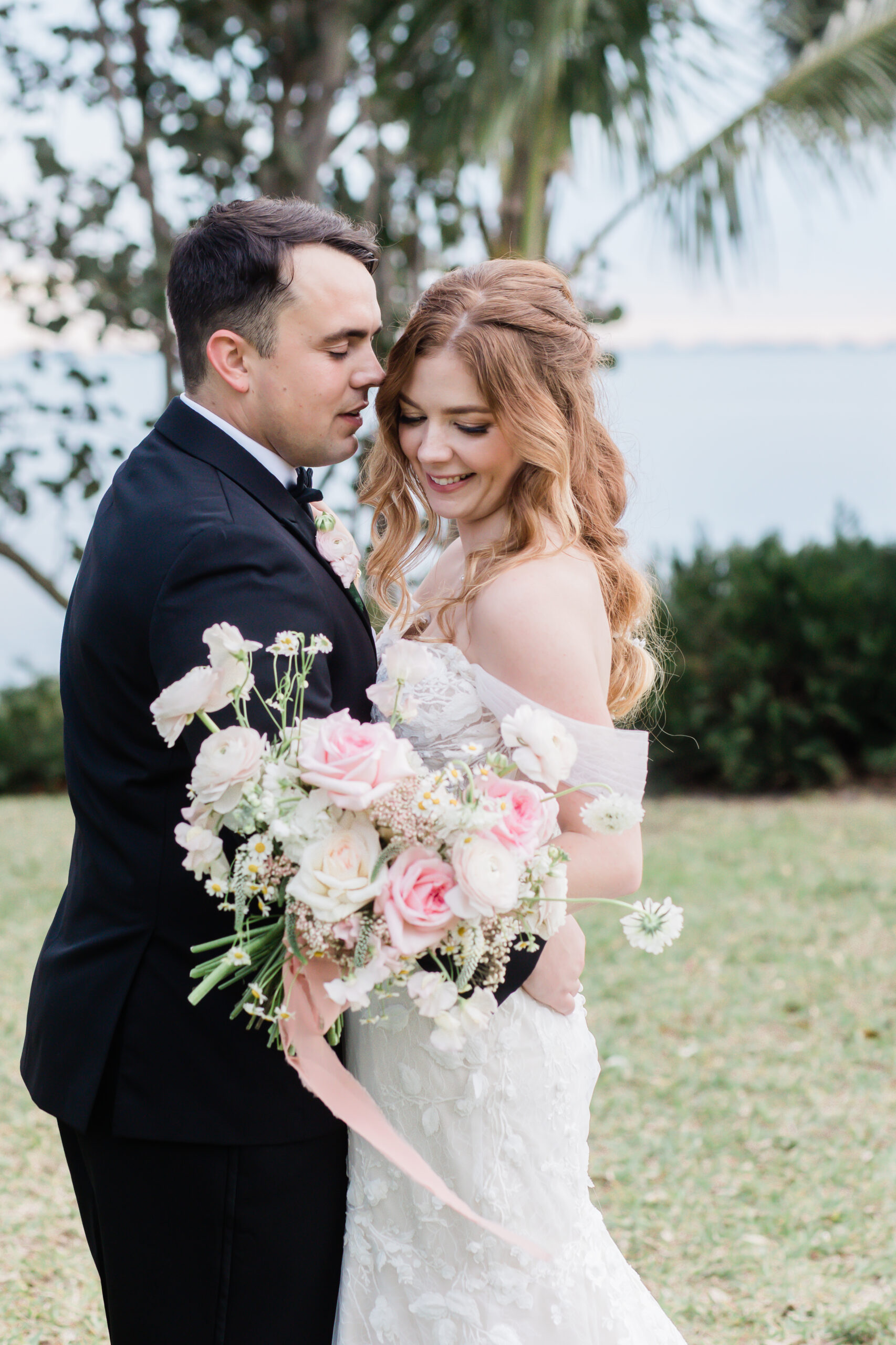 bride and groom by the Florida coast at Powel Crosley Estate