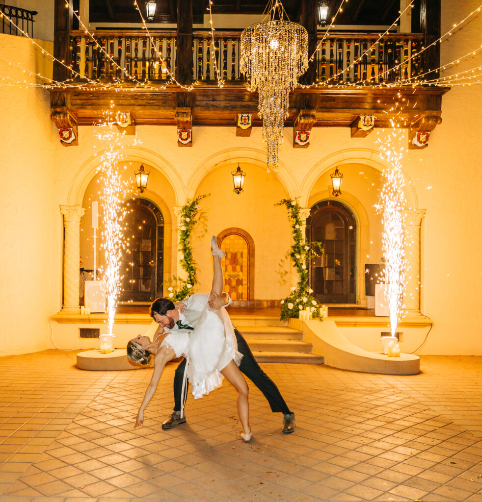 bride and groom dancing in front of sparklers at Powel Crosley Estate