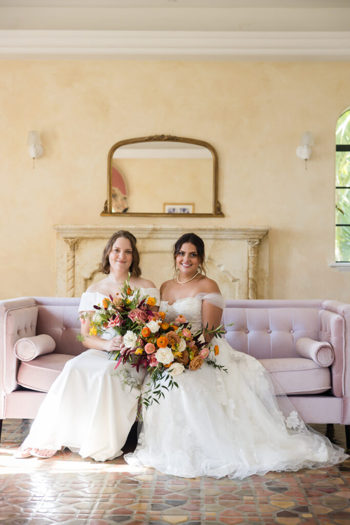 brides posing inside of Powel Crosley Estate