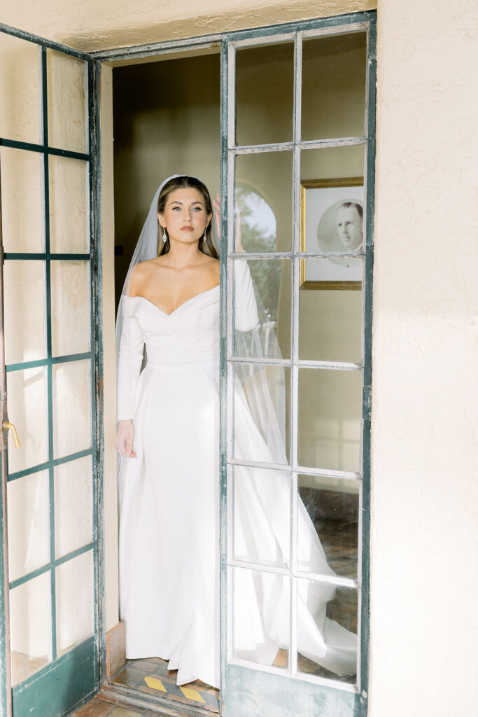 bride in modern and low cut wedding gown