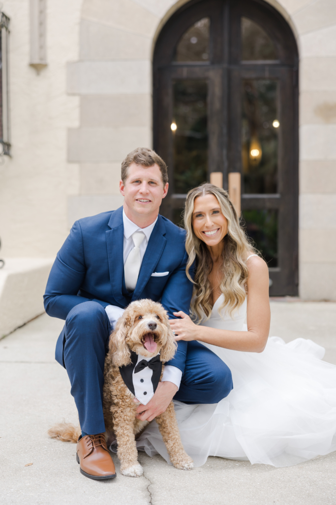 bride and groom portraits with their dog