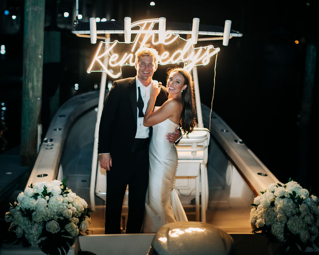 bride and groom portraits on boat at Sarasota Yacht Club