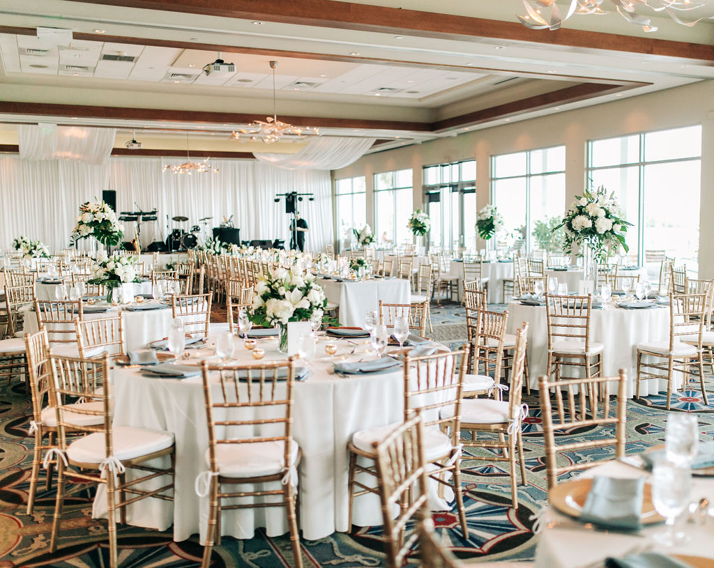 elegant wedding reception at Sarasota Yacht Club with teal details