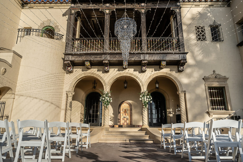 wedding ceremony at Powel Crosley Estate with chandelier 