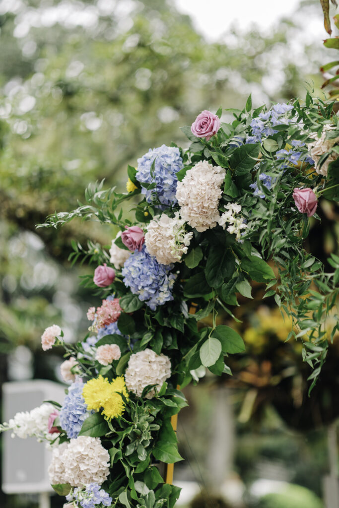 colorful floral wedding ceremony arch