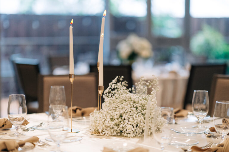 baby's breath wedding centerpiece with white candles