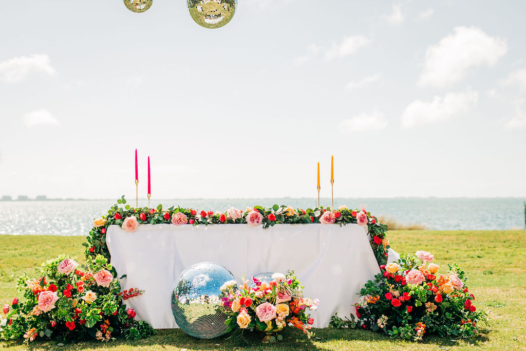 colorful sweetheart table decor at Powel Crosley wedding