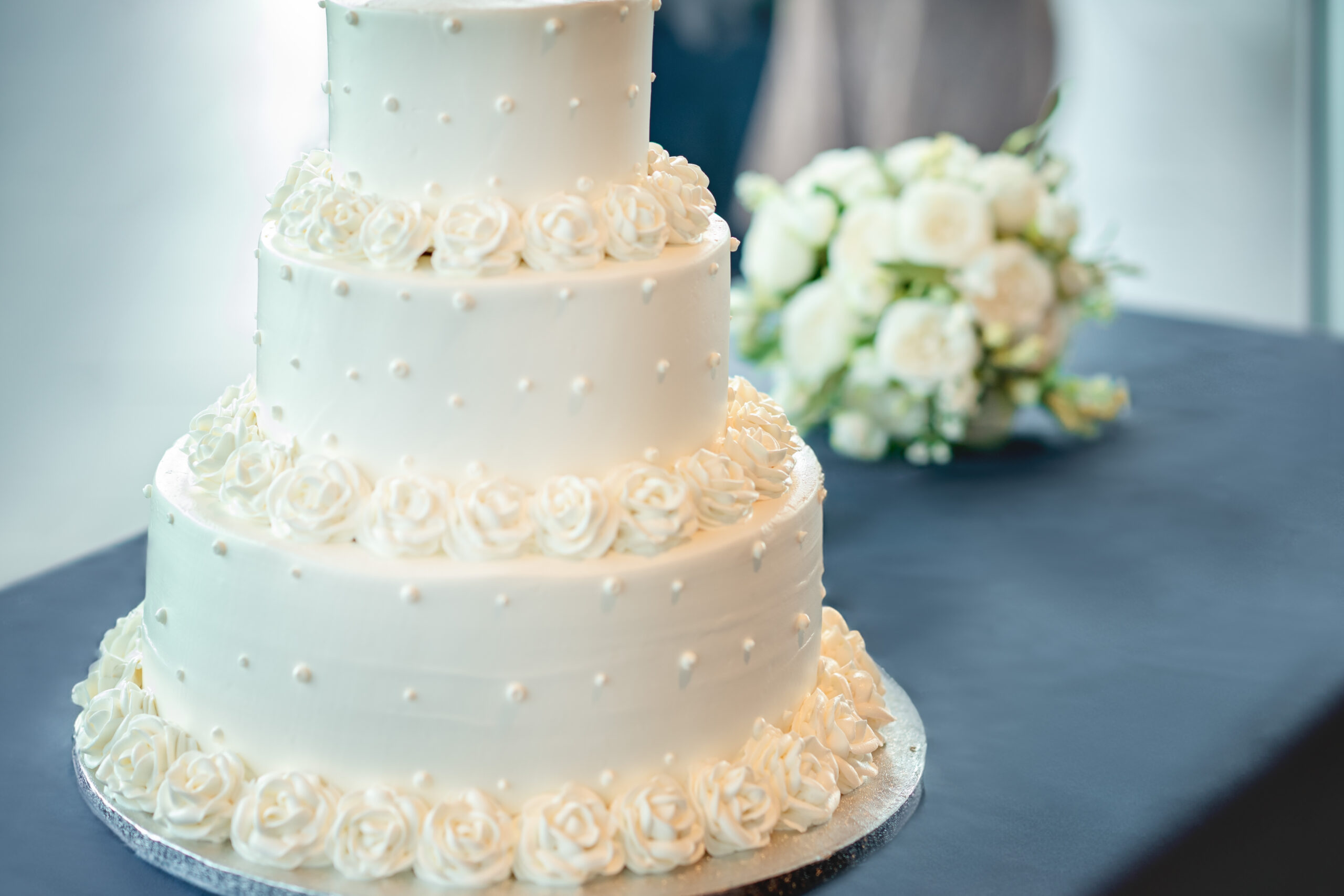 tiered wedding cake with floral decorations