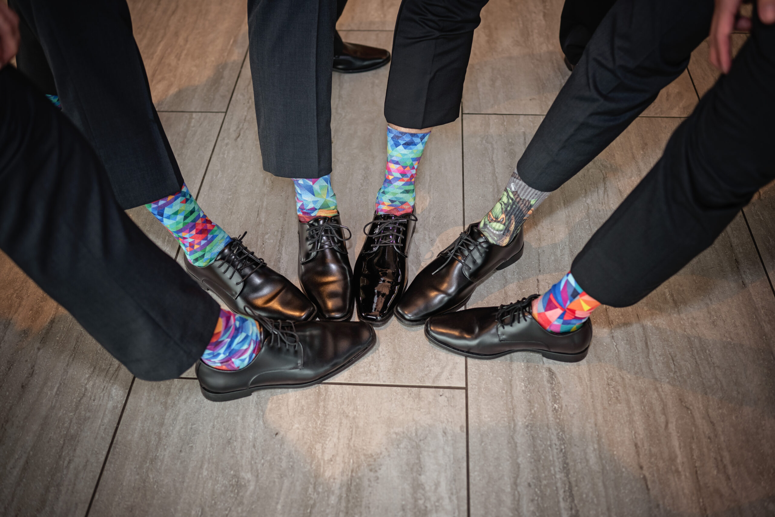 groomsmen in colorful socks