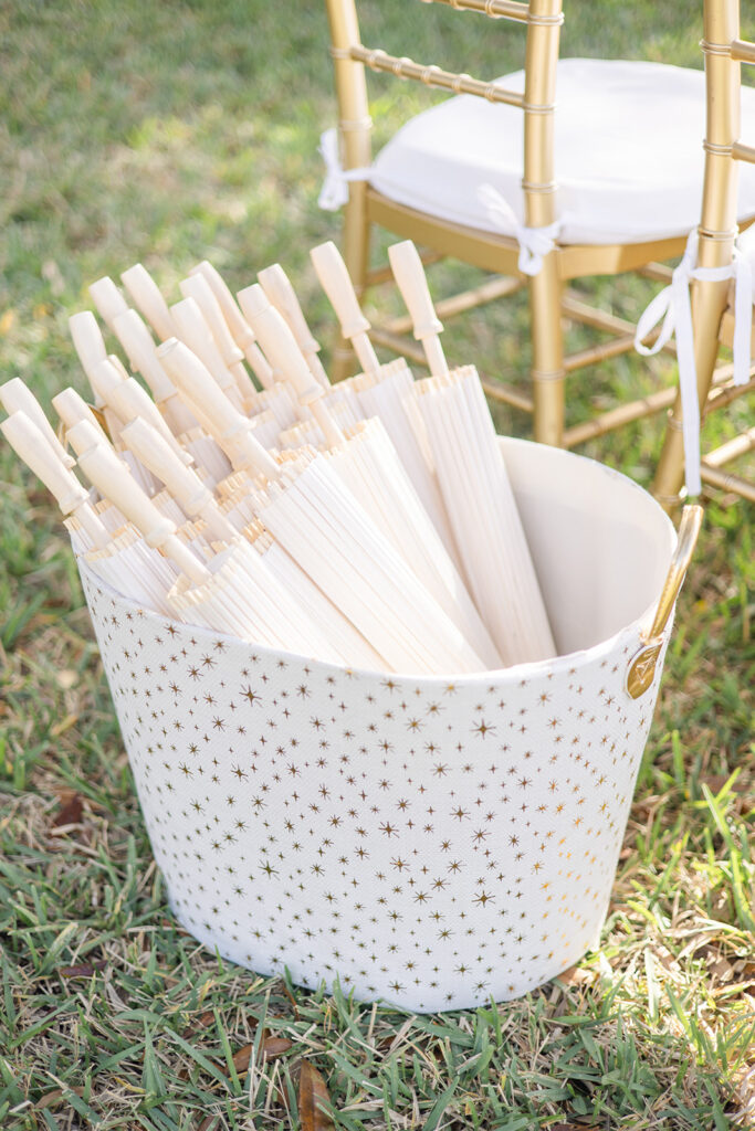 parasol favors at outdoor wedding