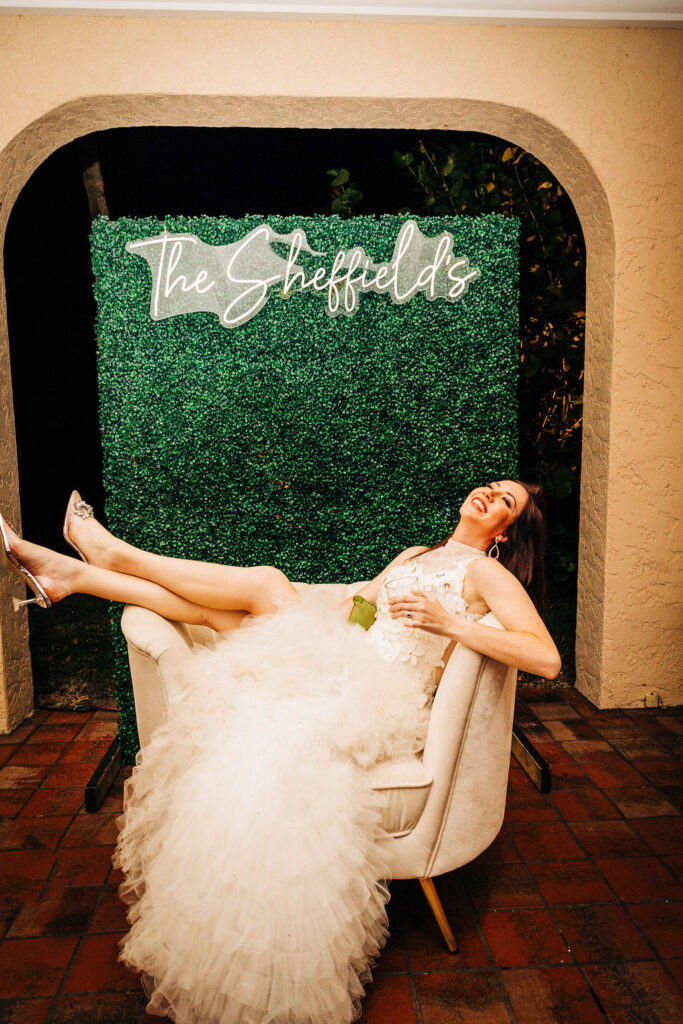 decorative greenery wall at a wedding