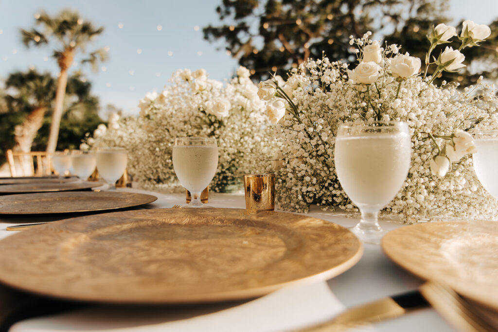 gold accents and white baby's breath wedding tablescape