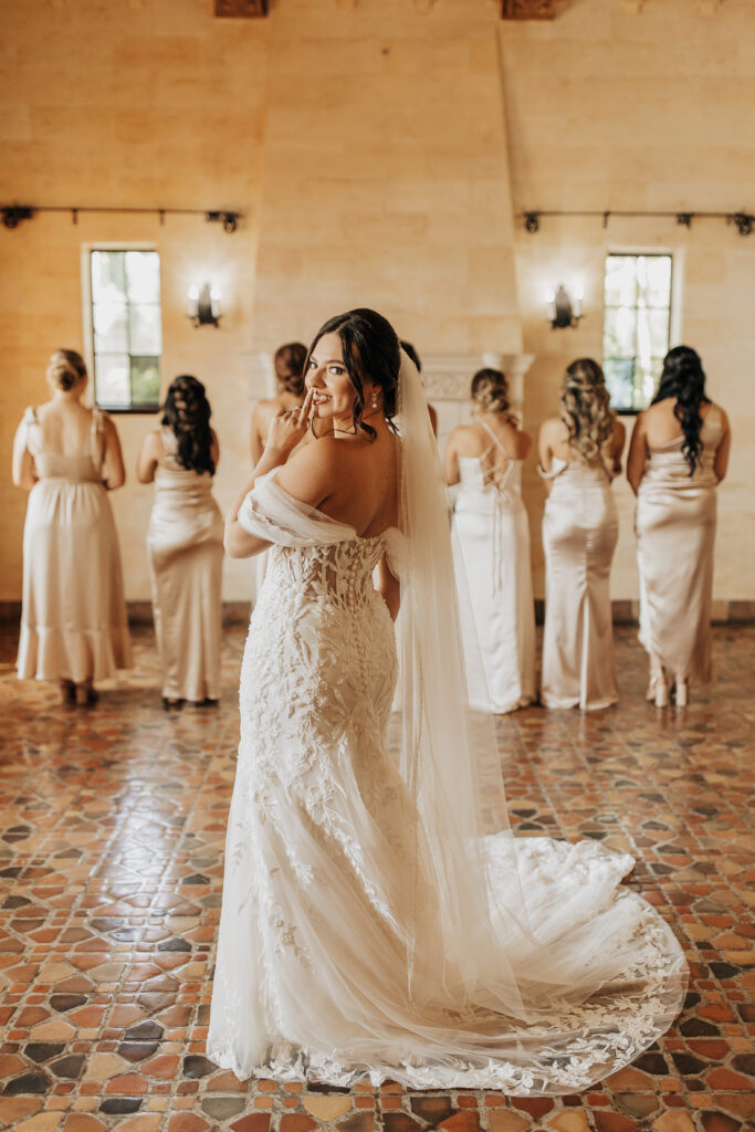 brides first look with her bridesmaids at Powel Crosley Estate