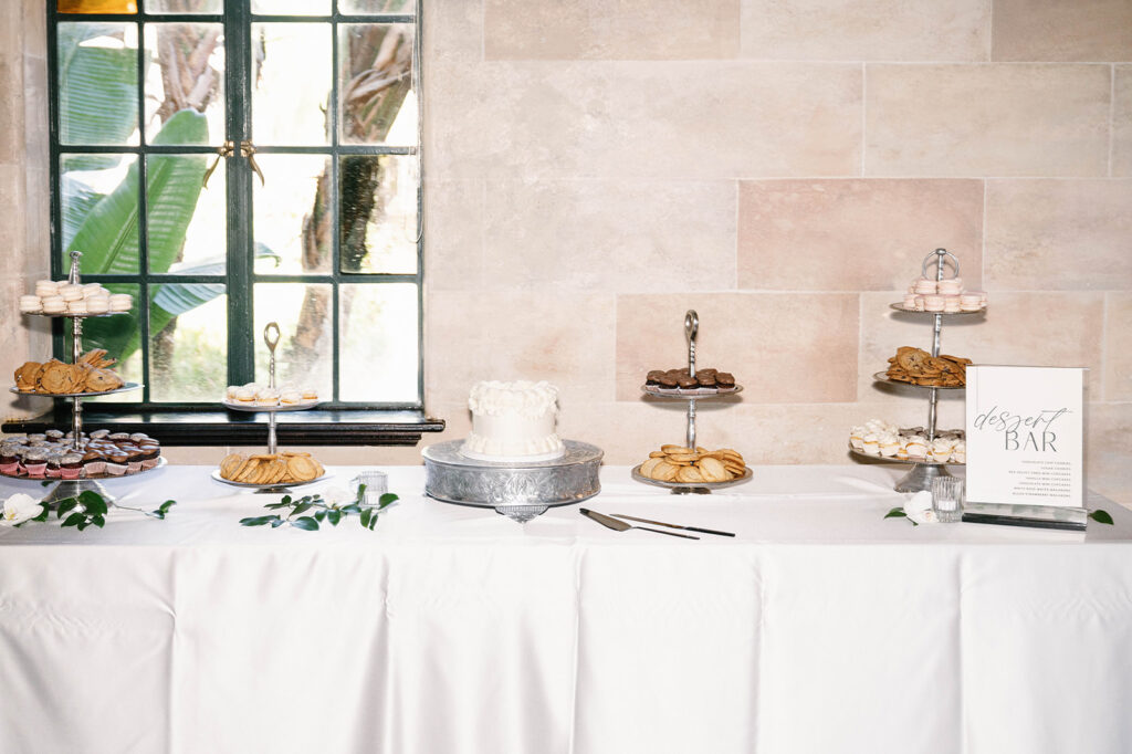 elegant dessert table at black and white wedding