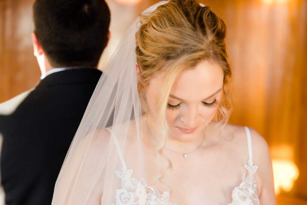 bride in simple makeup with veil