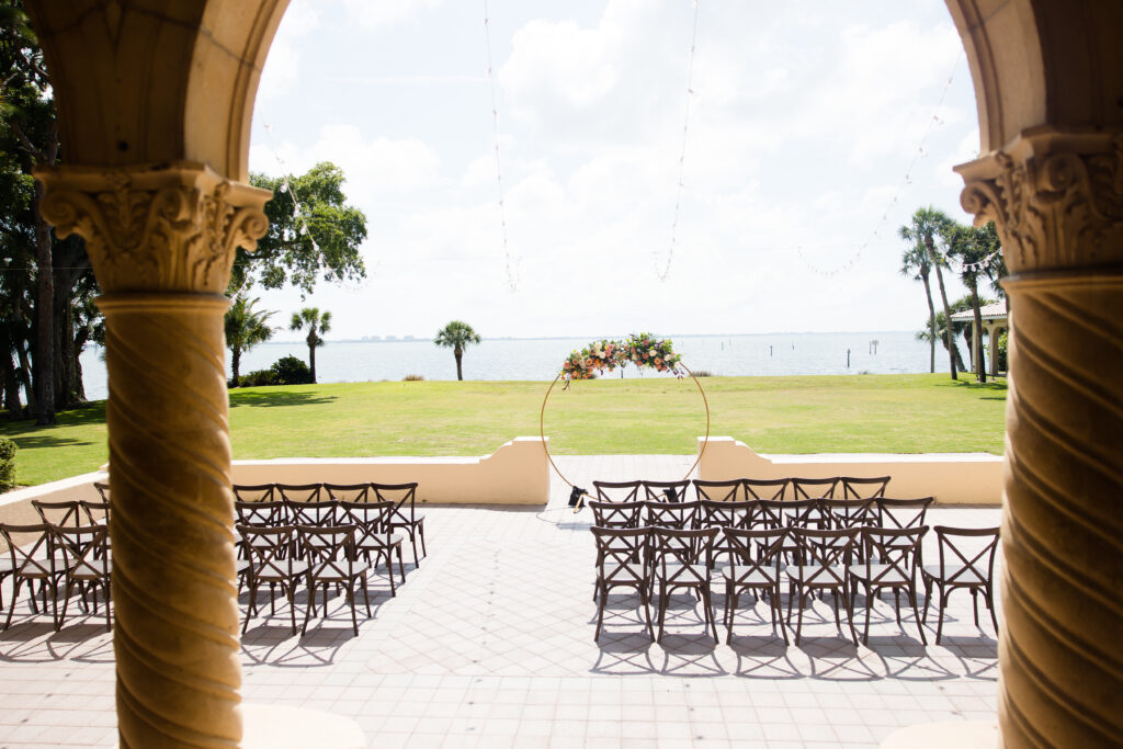 outdoor wedding ceremony at Powel Crosley Estate with circular arch