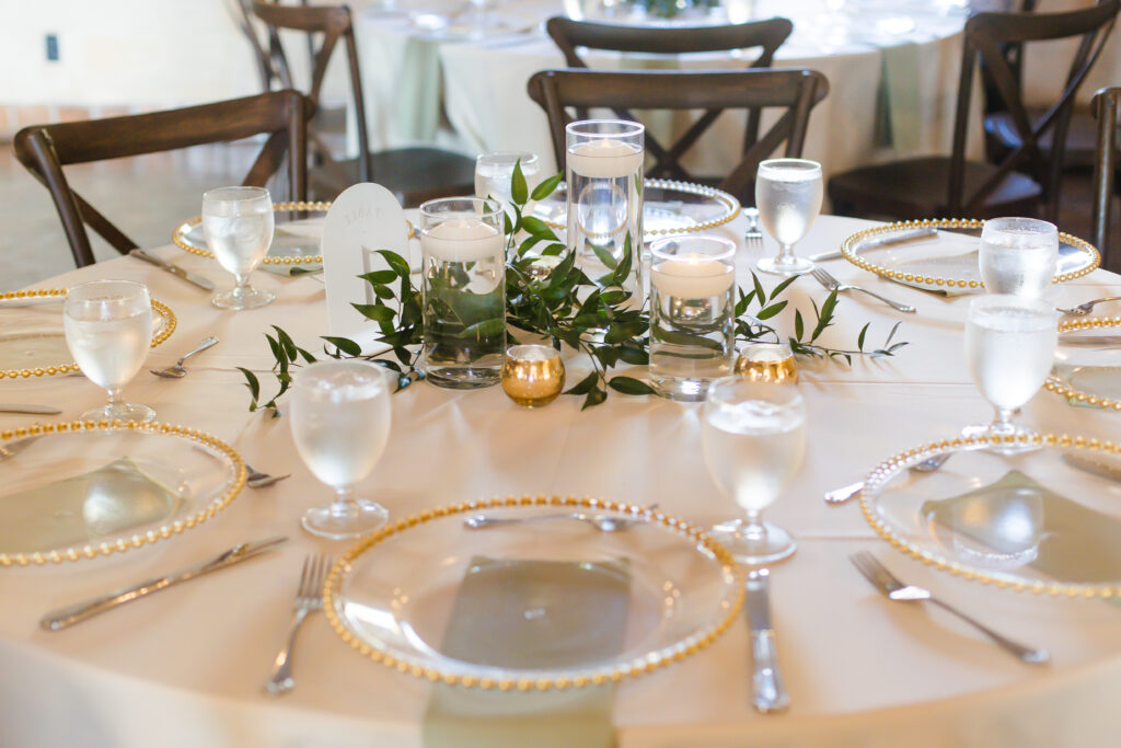 simple floral and candle wedding centerpieces