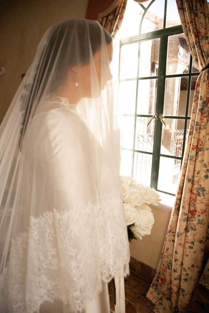 bride in vintage wedding veil with lace