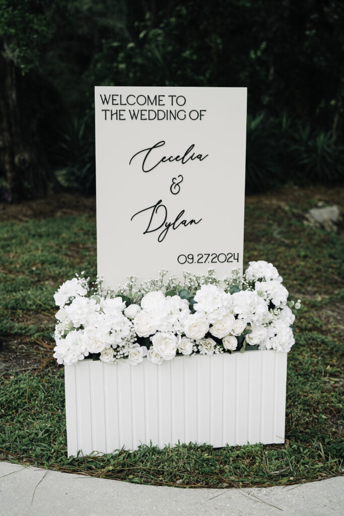 elegant white wedding welcome sign