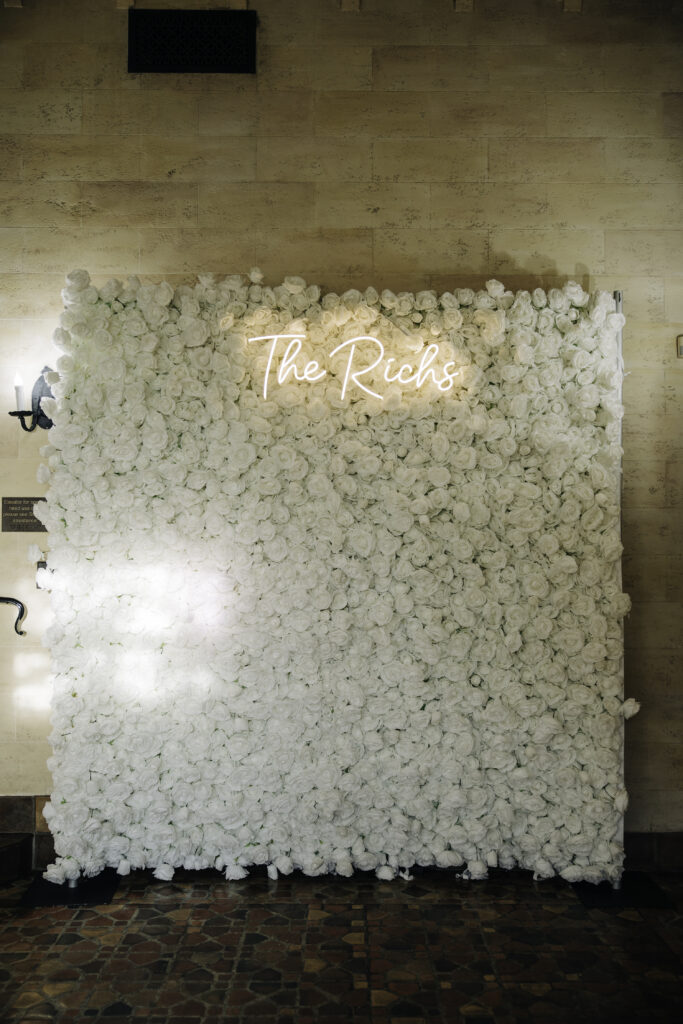 white rose wall at wedding 