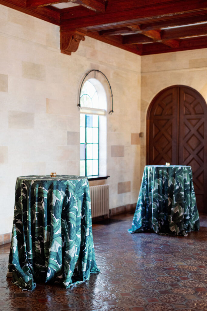 green patterned linens for cocktail hour