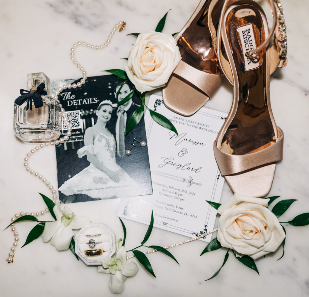 vintage wedding invitation flatlay with bridal accessories